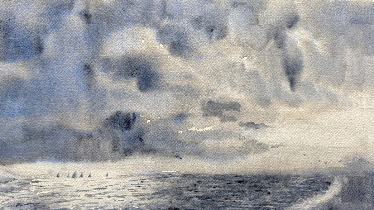A square watercolor painting of a dramatic seascape with stormy clouds and a dark ocean, placed on a dark wooden surface.